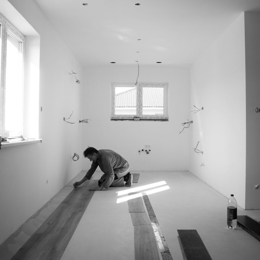 A floor layer fitting new boards