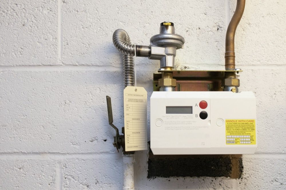A wall-mounted boiler and its pipework